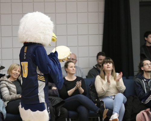SCA Parents cheering on the basketball team